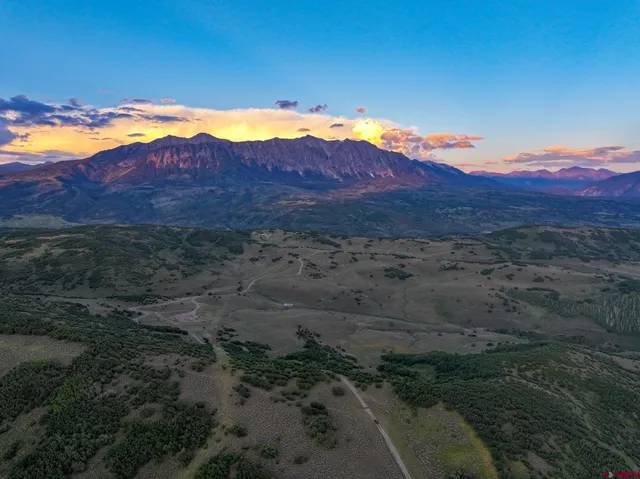 a view of mountain and an outdoor space