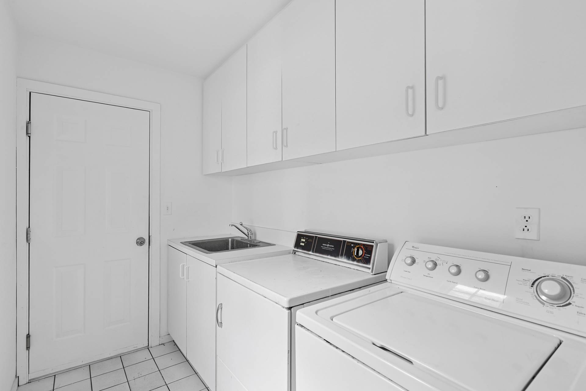 144 Hands Creek Road East Hampton, NY 11937 - Photo 14 of 32 a view of storage and utility room with washer and dryer