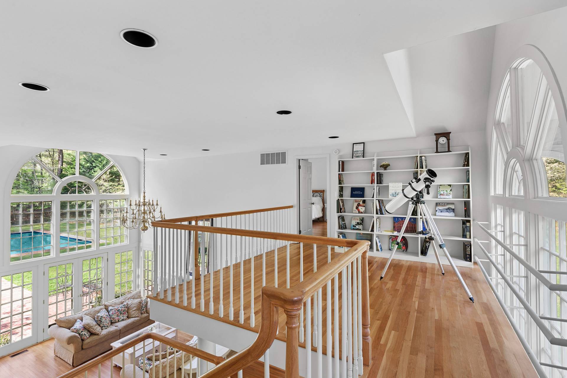 144 Hands Creek Road East Hampton, NY 11937 - Photo 17 of 32 a view of a living room and a floor to ceiling window