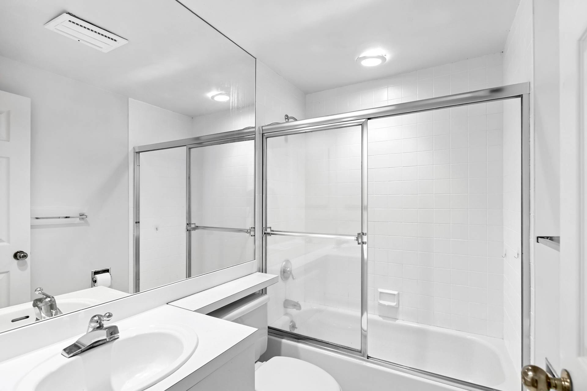 144 Hands Creek Road East Hampton, NY 11937 - Photo 22 of 32 a bathroom with a sink toilet and shower