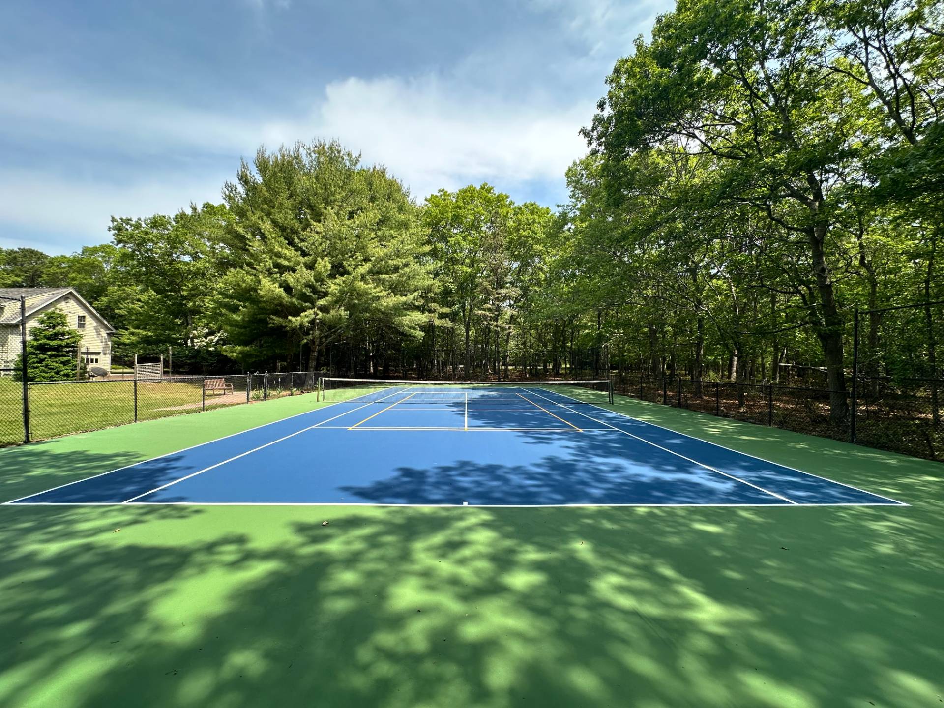 144 Hands Creek Road East Hampton, NY 11937 - Photo 30 of 32 a view of a tennis court