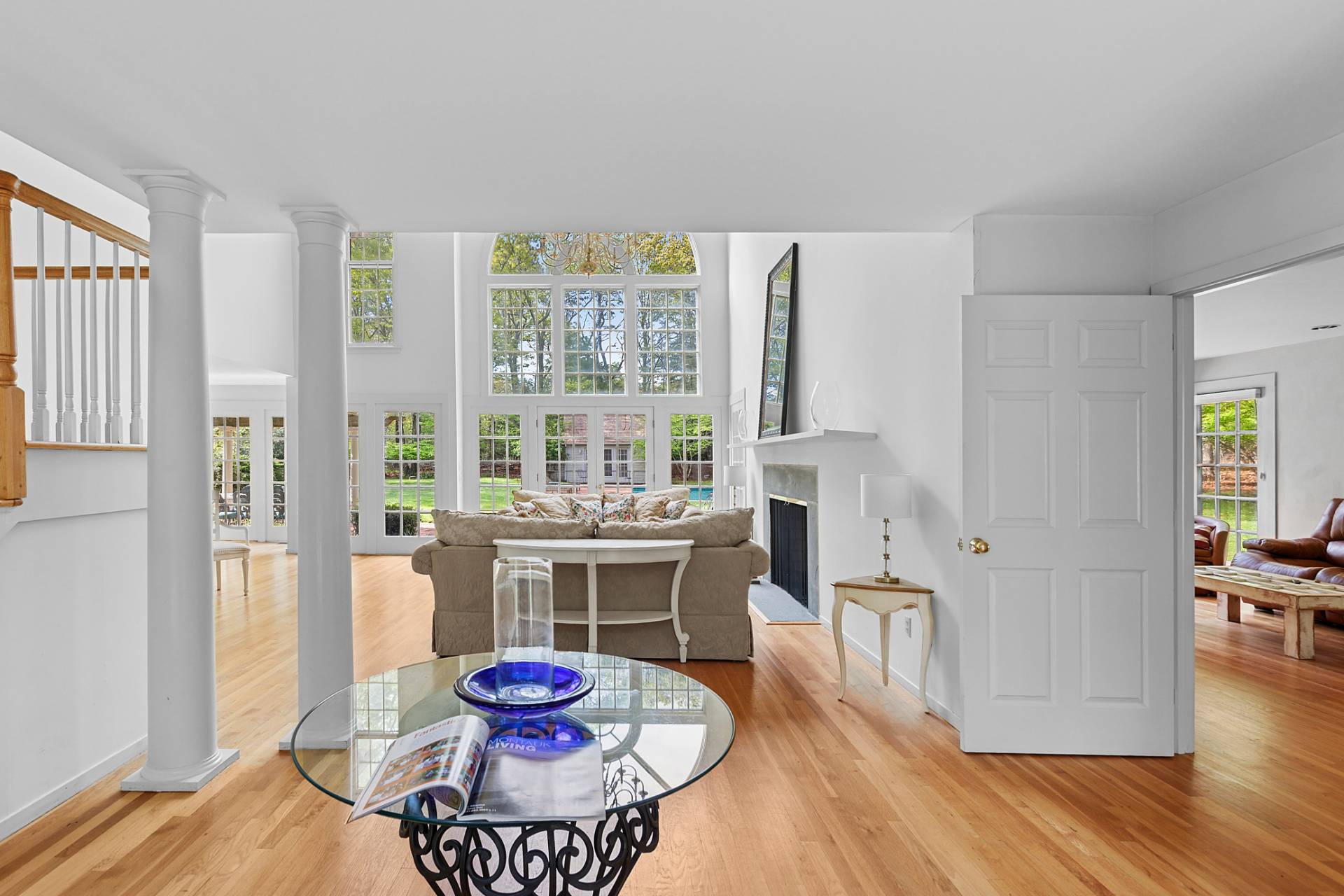 144 Hands Creek Road East Hampton, NY 11937 - Photo 4 of 32 a living room with furniture and a large window