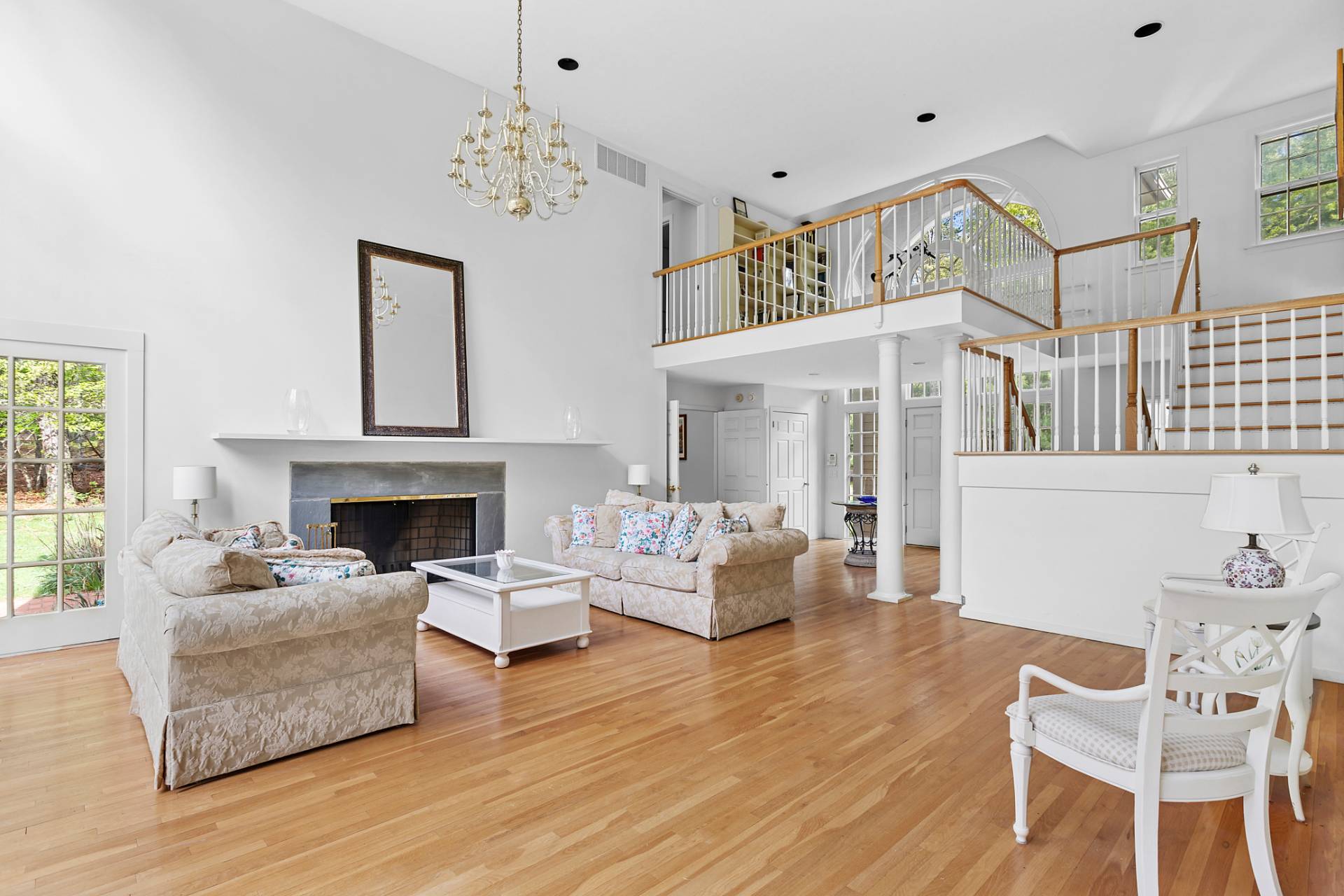 144 Hands Creek Road East Hampton, NY 11937 - Photo 5 of 32 a living room with furniture and a fireplace