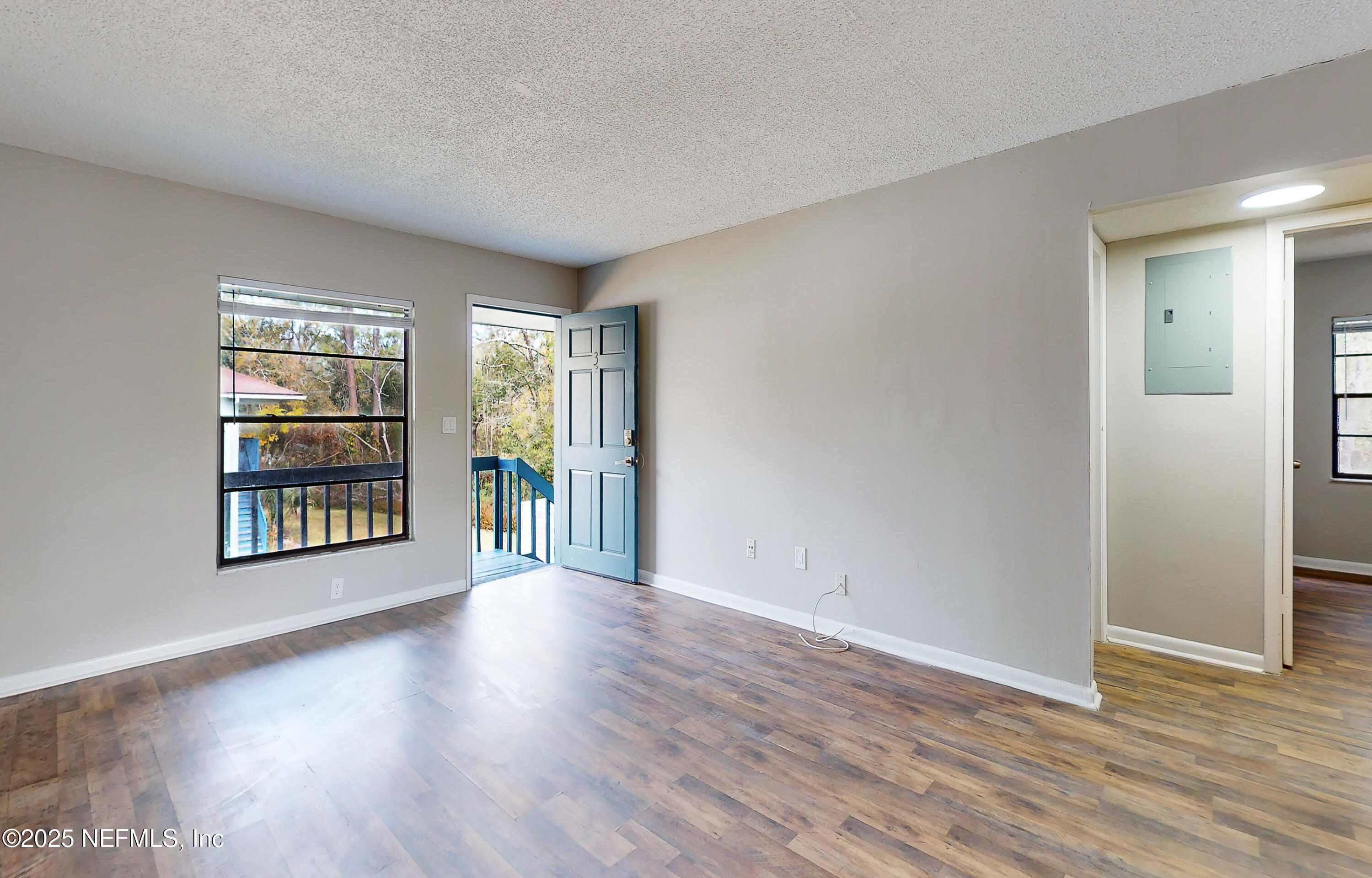 7080 Wiley Road, Unit 3 Jacksonville, FL 32210 - Photo 2 of 18 2 Living Rm b