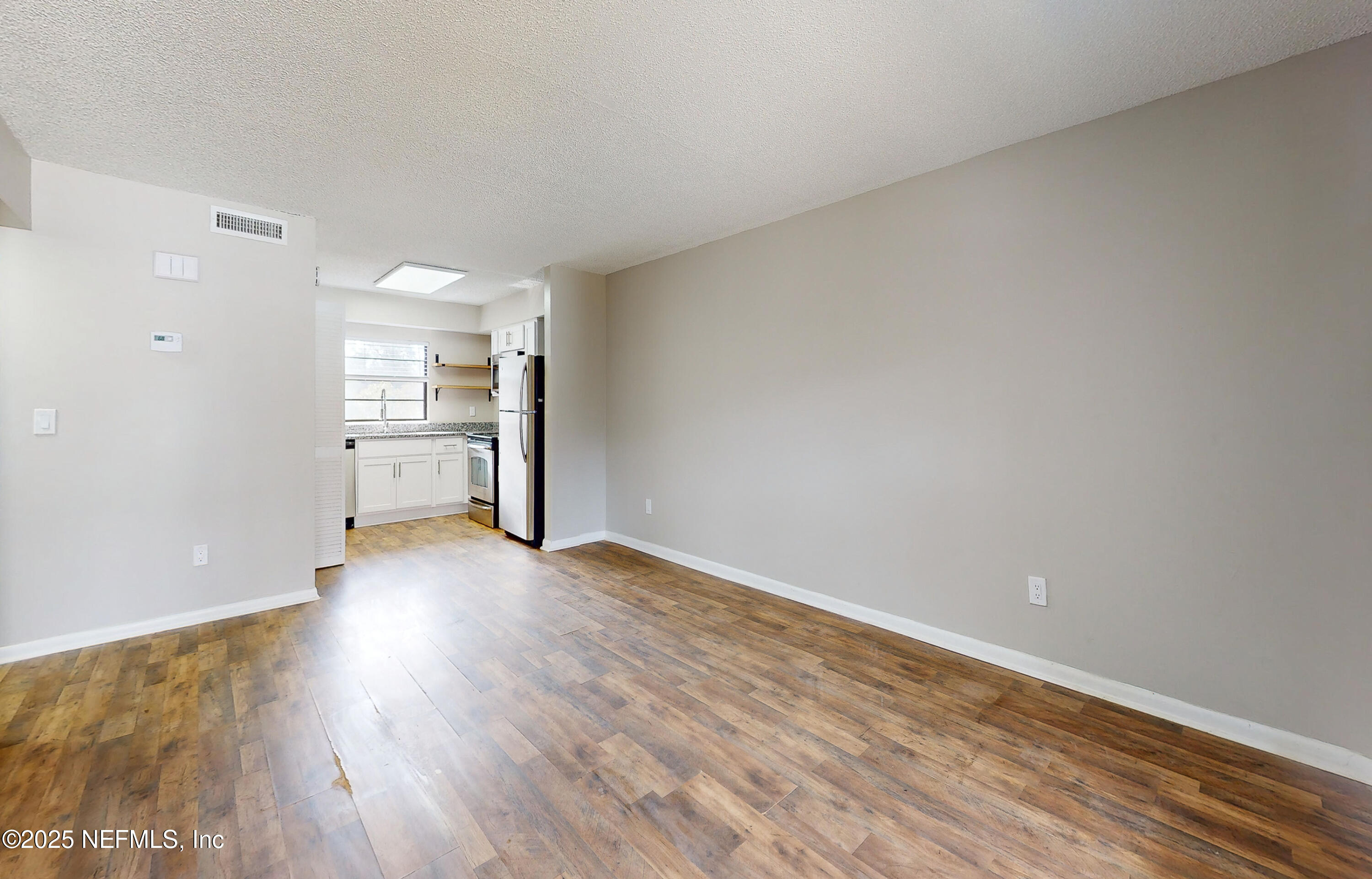 7080 Wiley Road, Unit 3 Jacksonville, FL 32210 - Photo 3 of 18 3 Living Rm a