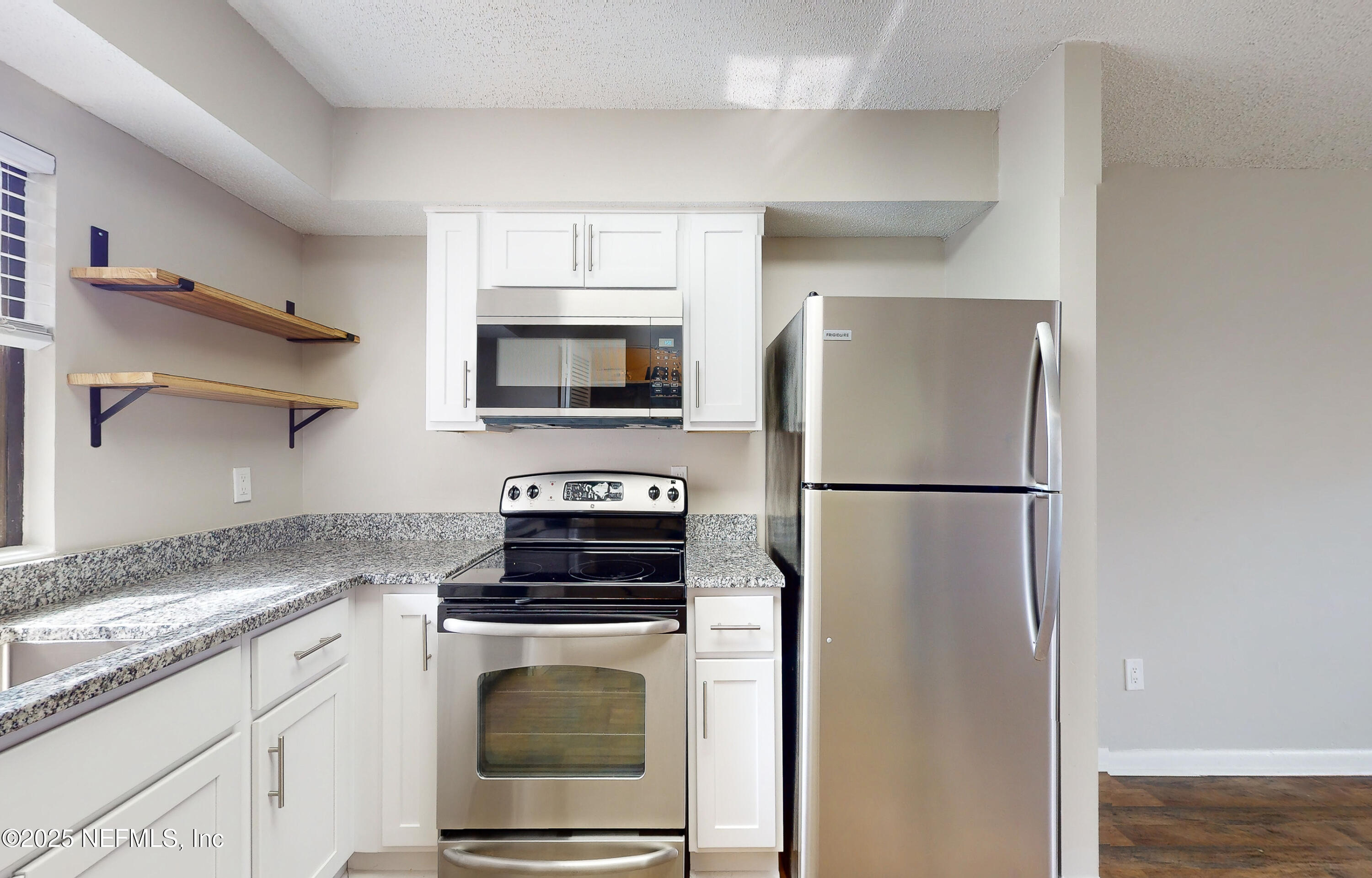 7080 Wiley Road, Unit 3 Jacksonville, FL 32210 - Photo 5 of 18 5 Kitchen b