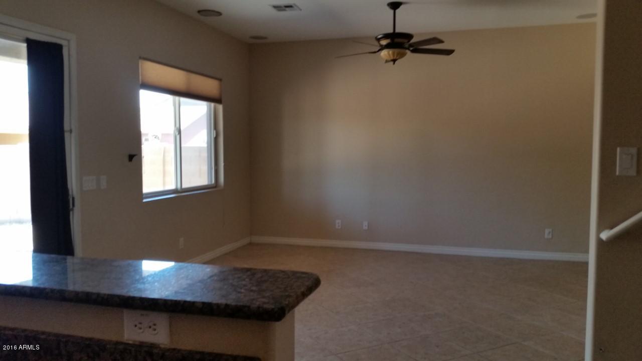 4926 West Apollo Road Laveen, AZ 85339 - Photo 5 of 23 Family room (looking from kitchen)