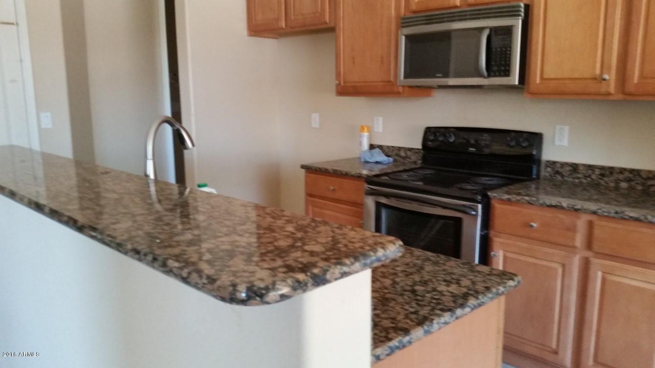 4926 West Apollo Road Laveen, AZ 85339 - Photo 8 of 23 Kitchen with granite island