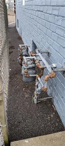 a view of a backyard of the house