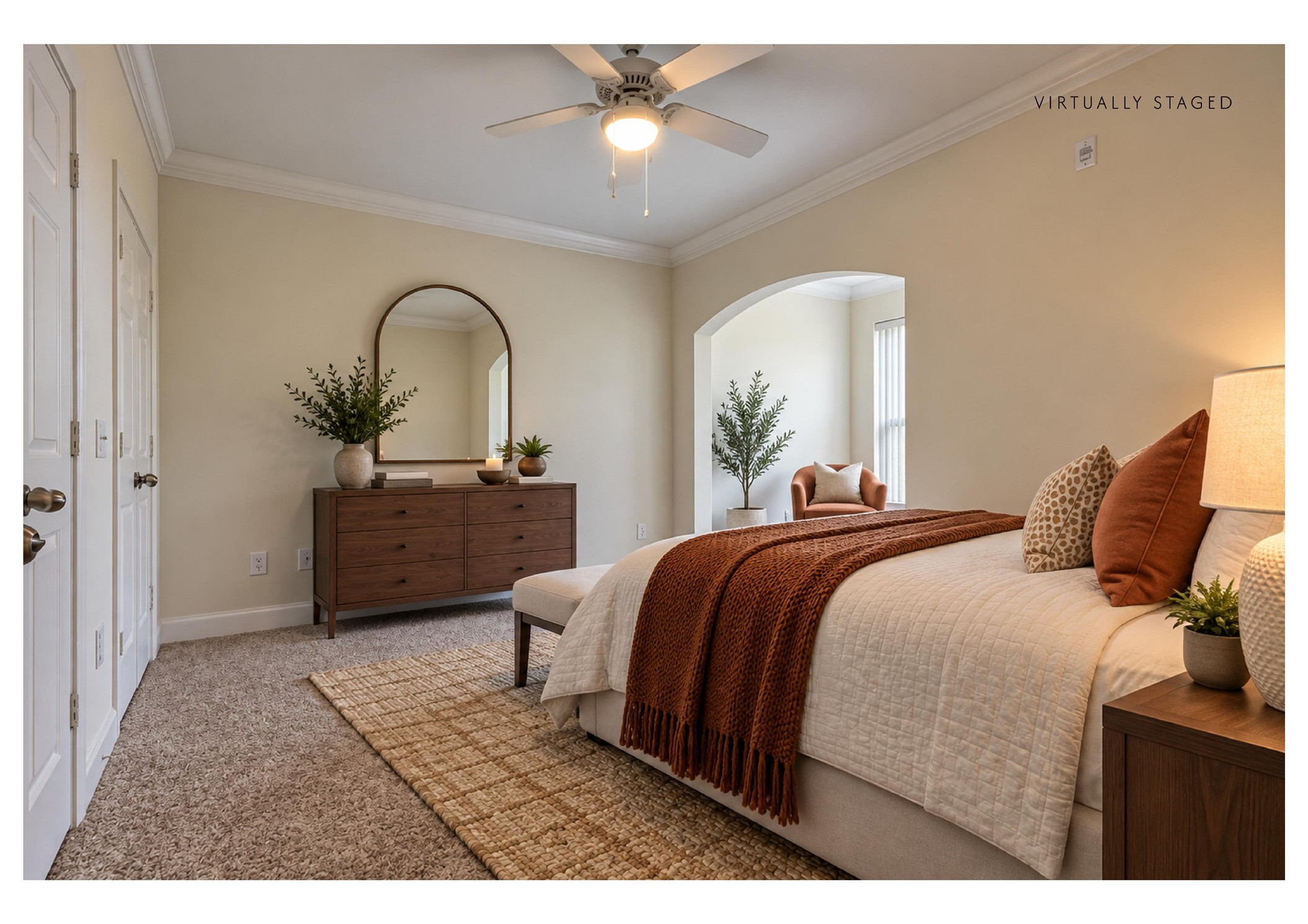 7701 Rialto Boulevard, Unit 1326 Austin, TX 78735 - Photo 11 of 20 The staged version shows how it could look: crown molding and soft carpeting elevate this peaceful bedroom with an arched alcove.