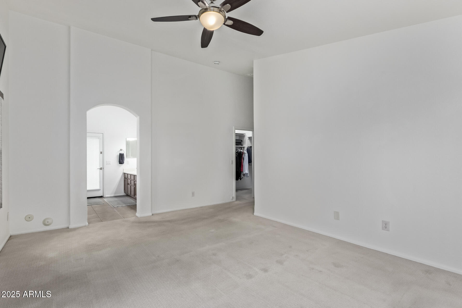 21765 Backus Drive Maricopa, AZ 85138 - Photo 26 of 43 an empty room with a bathroom