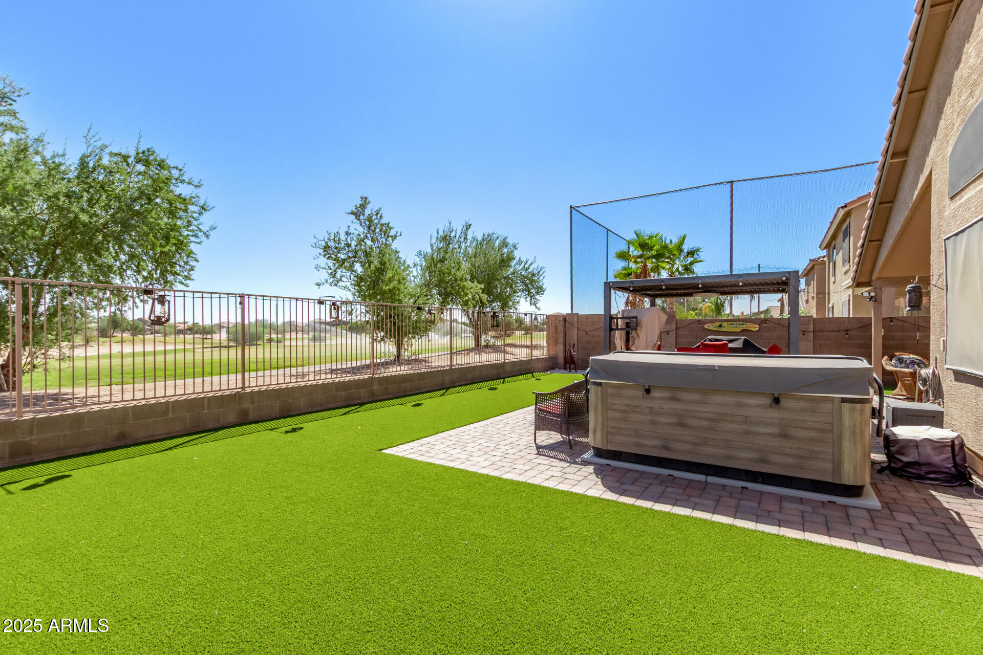 21765 Backus Drive Maricopa, AZ 85138 - Photo 38 of 43 a view of a backyard with a garden