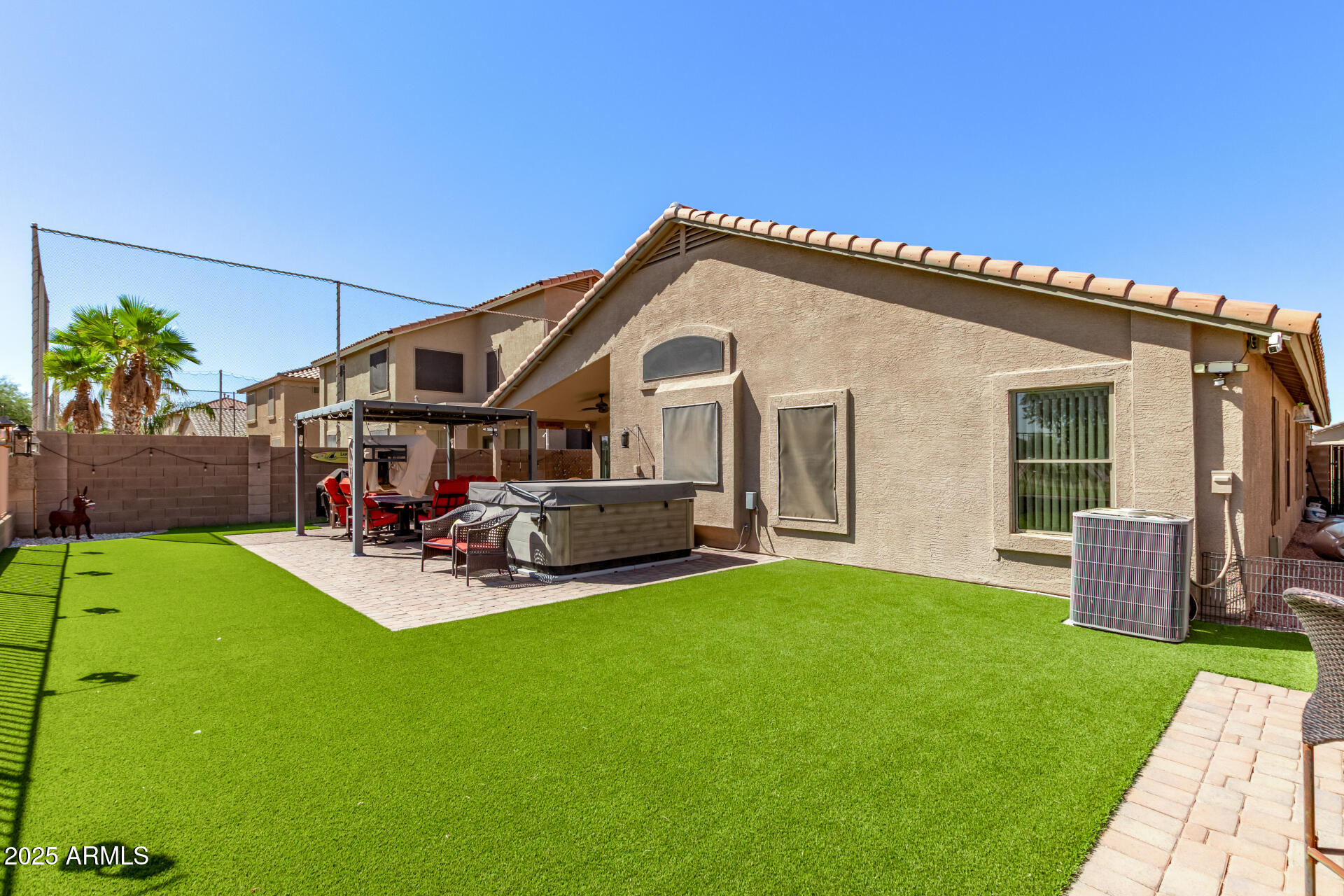 21765 Backus Drive Maricopa, AZ 85138 - Photo 39 of 43 a view of a house with backyard porch and sitting area