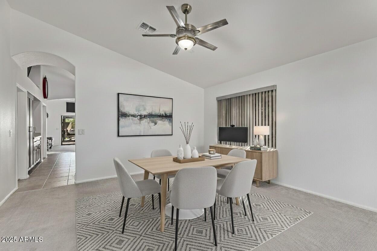 21765 Backus Drive Maricopa, AZ 85138 - Photo 8 of 43 a view of a dining room with furniture