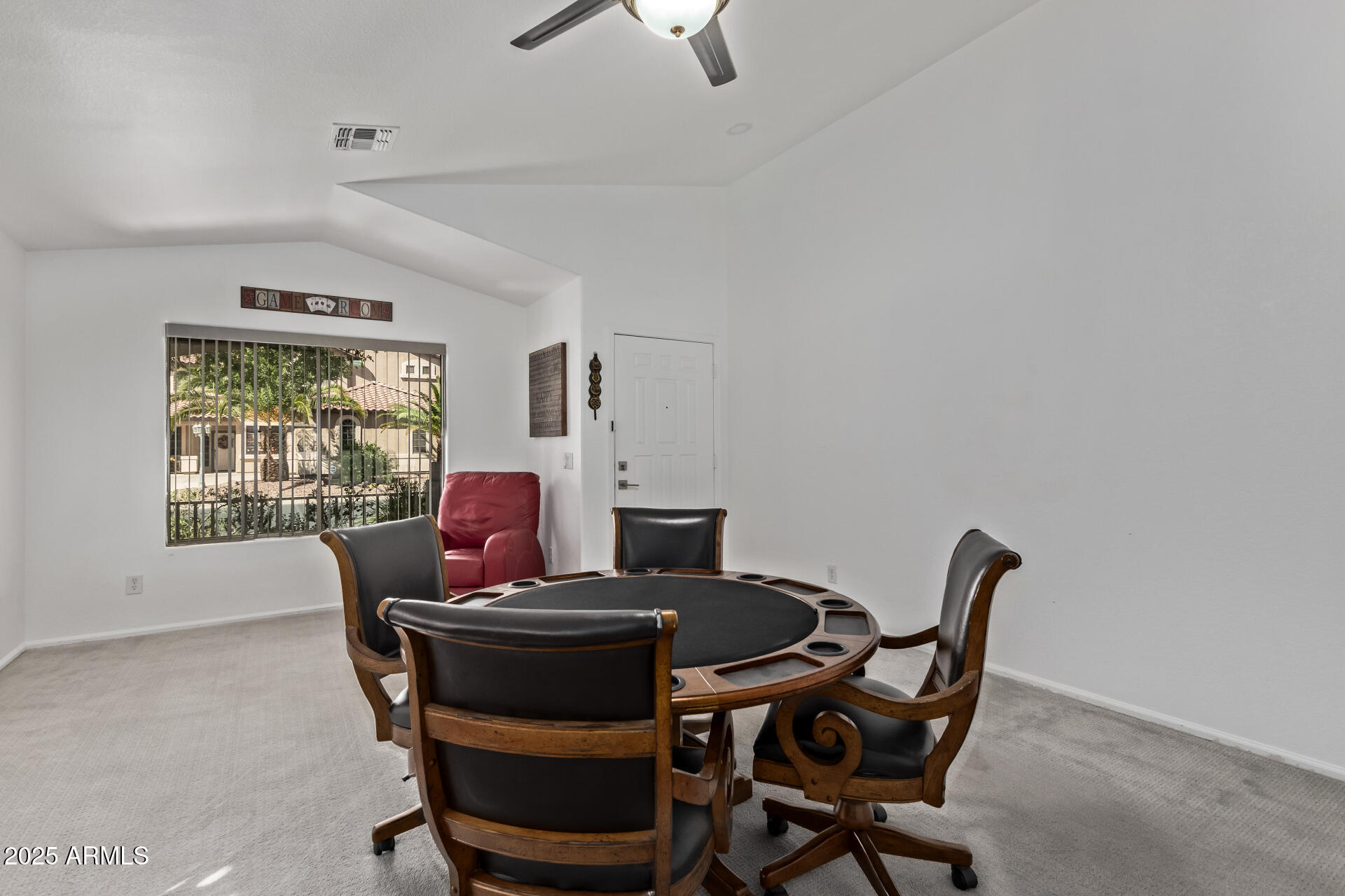 21765 Backus Drive Maricopa, AZ 85138 - Photo 9 of 43 a work room with furniture and window