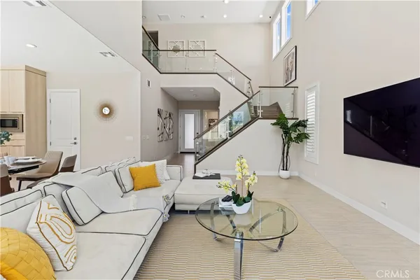 a living room with furniture or couch and a flat screen tv