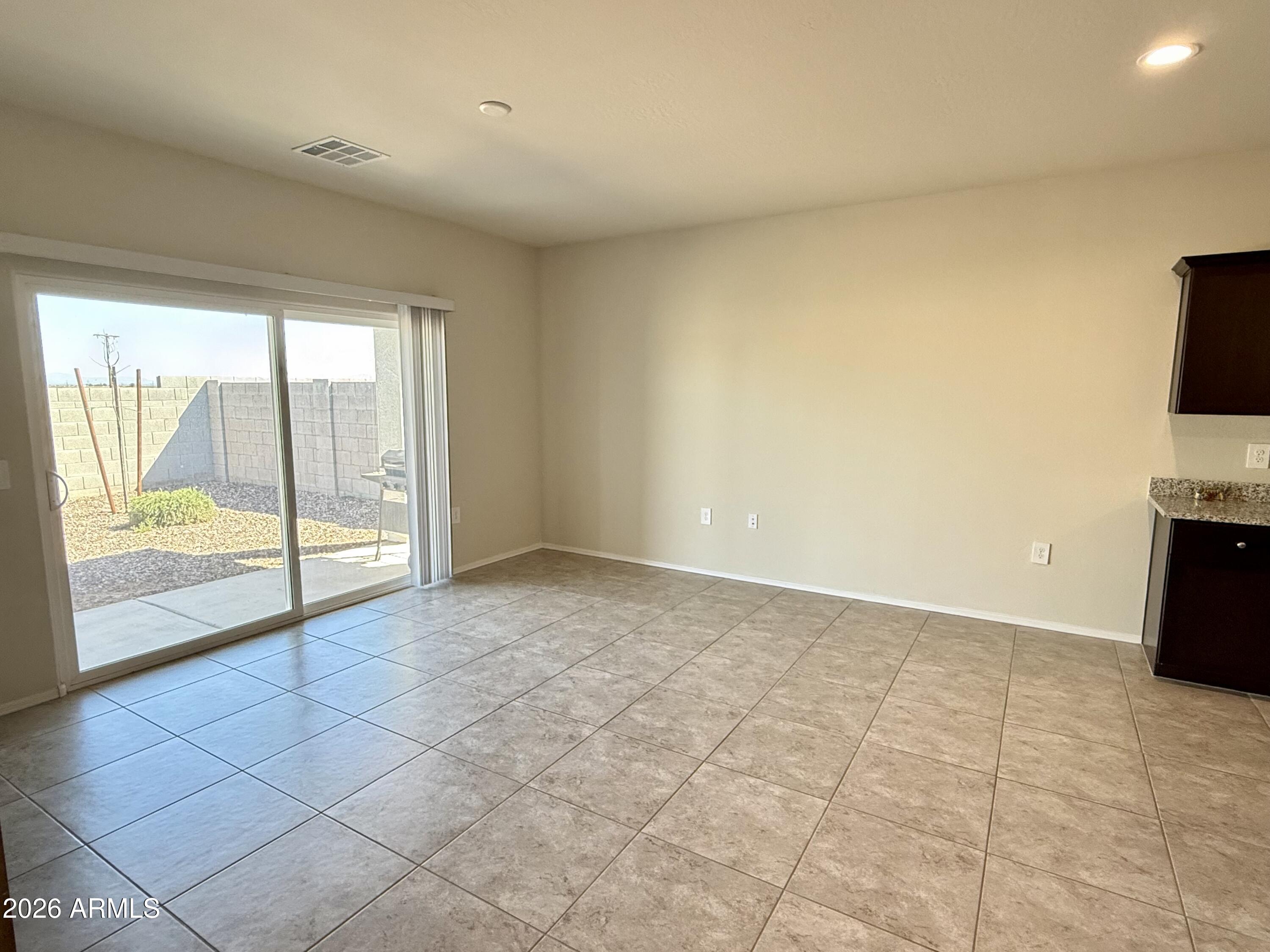 2207 South 46th Street Coolidge, AZ 85128 - Photo 15 of 35 a view of an empty room and a window