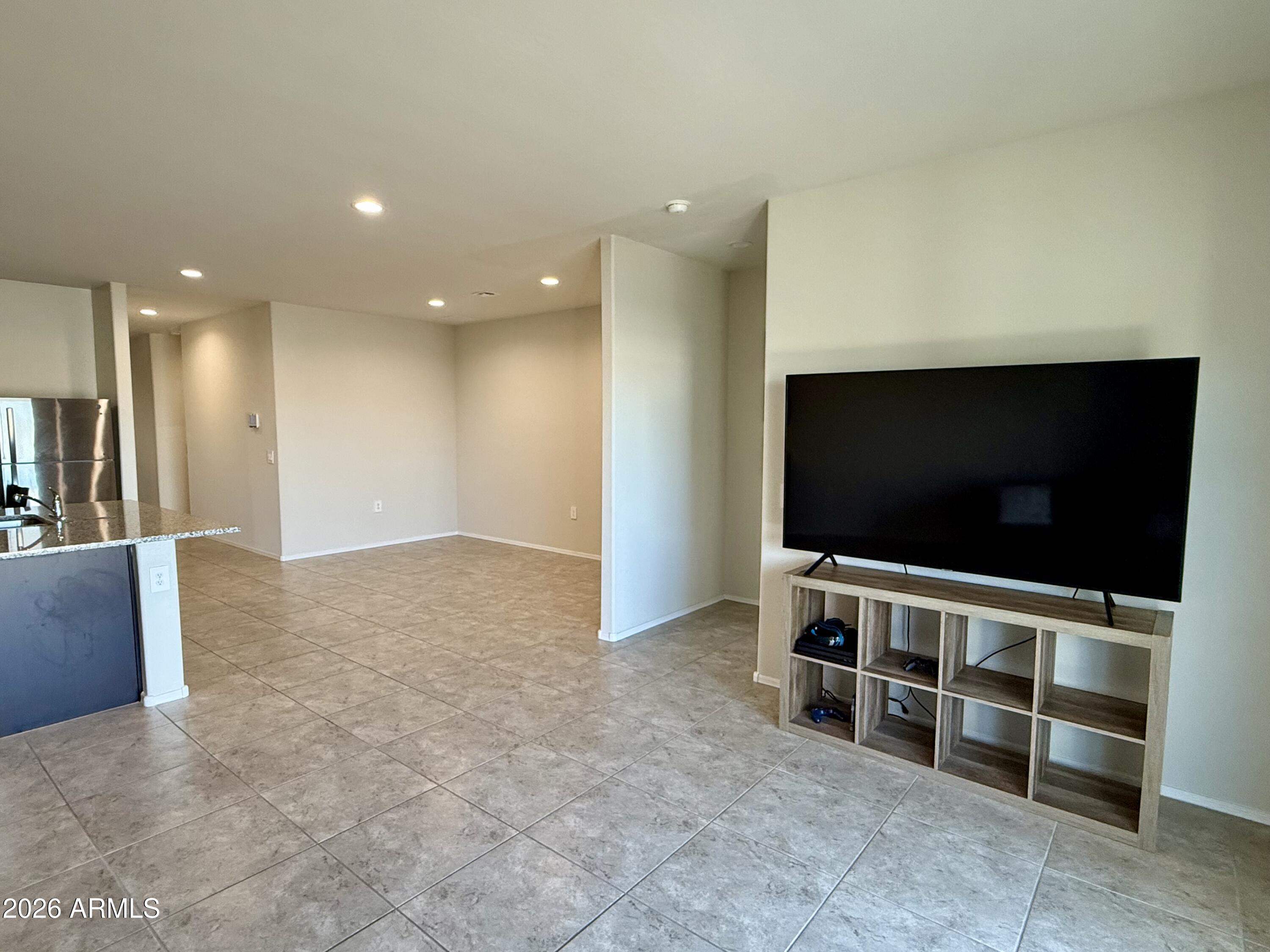 2207 South 46th Street Coolidge, AZ 85128 - Photo 16 of 35 a living room with a flat screen tv