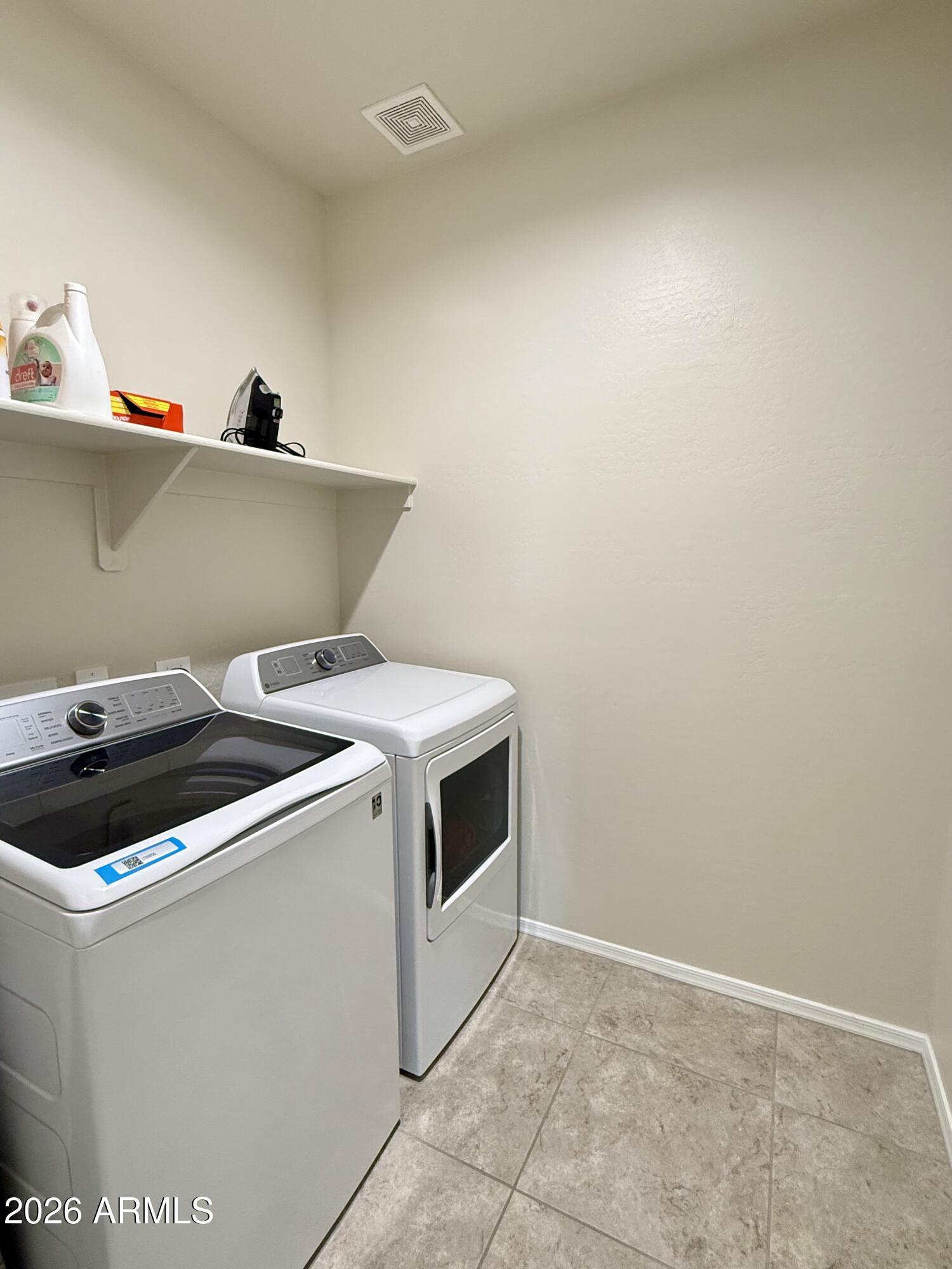2207 South 46th Street Coolidge, AZ 85128 - Photo 18 of 35 a utility room with dryer and washer