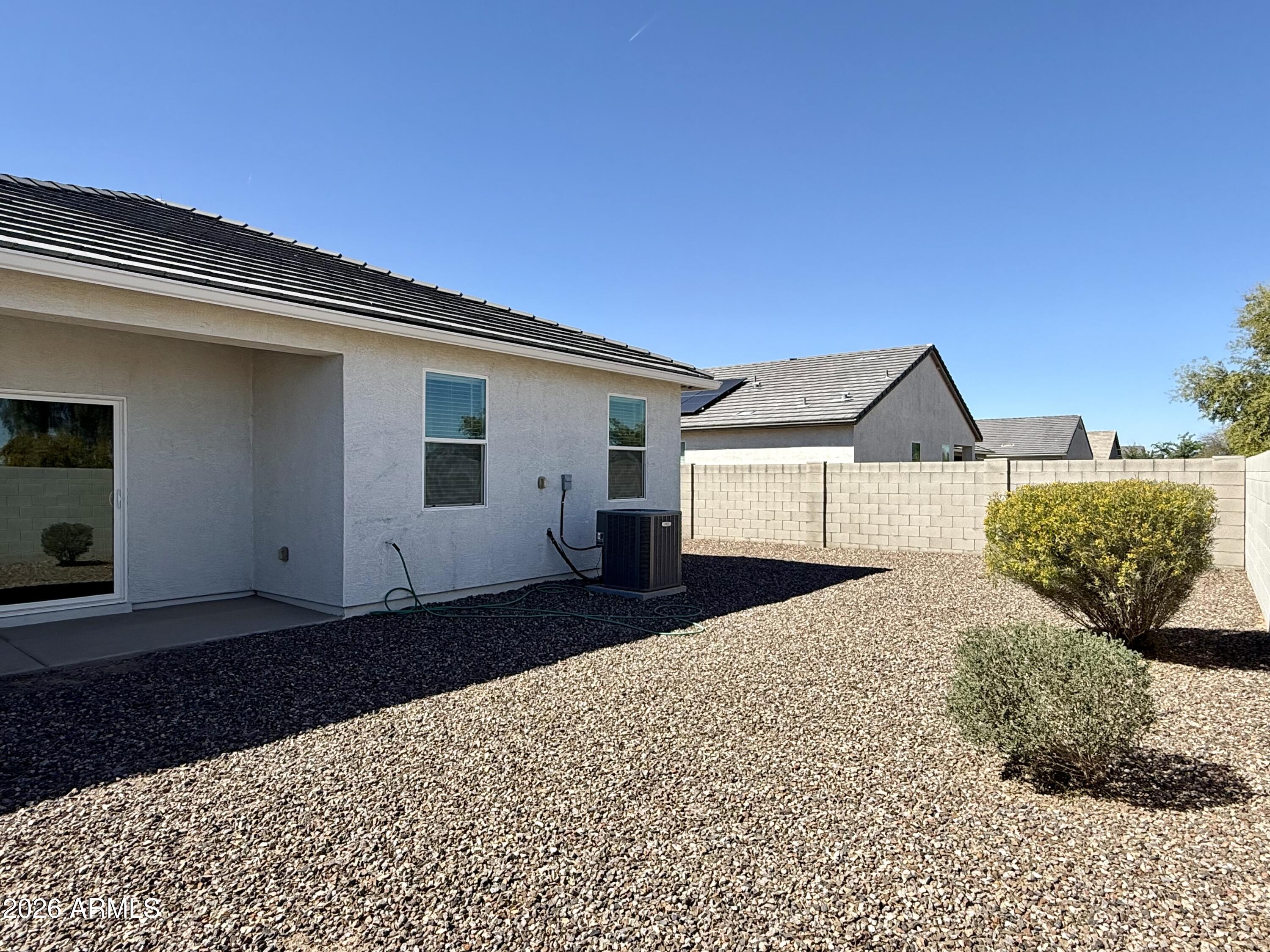 2207 South 46th Street Coolidge, AZ 85128 - Photo 32 of 35 a front view of a house with a yard