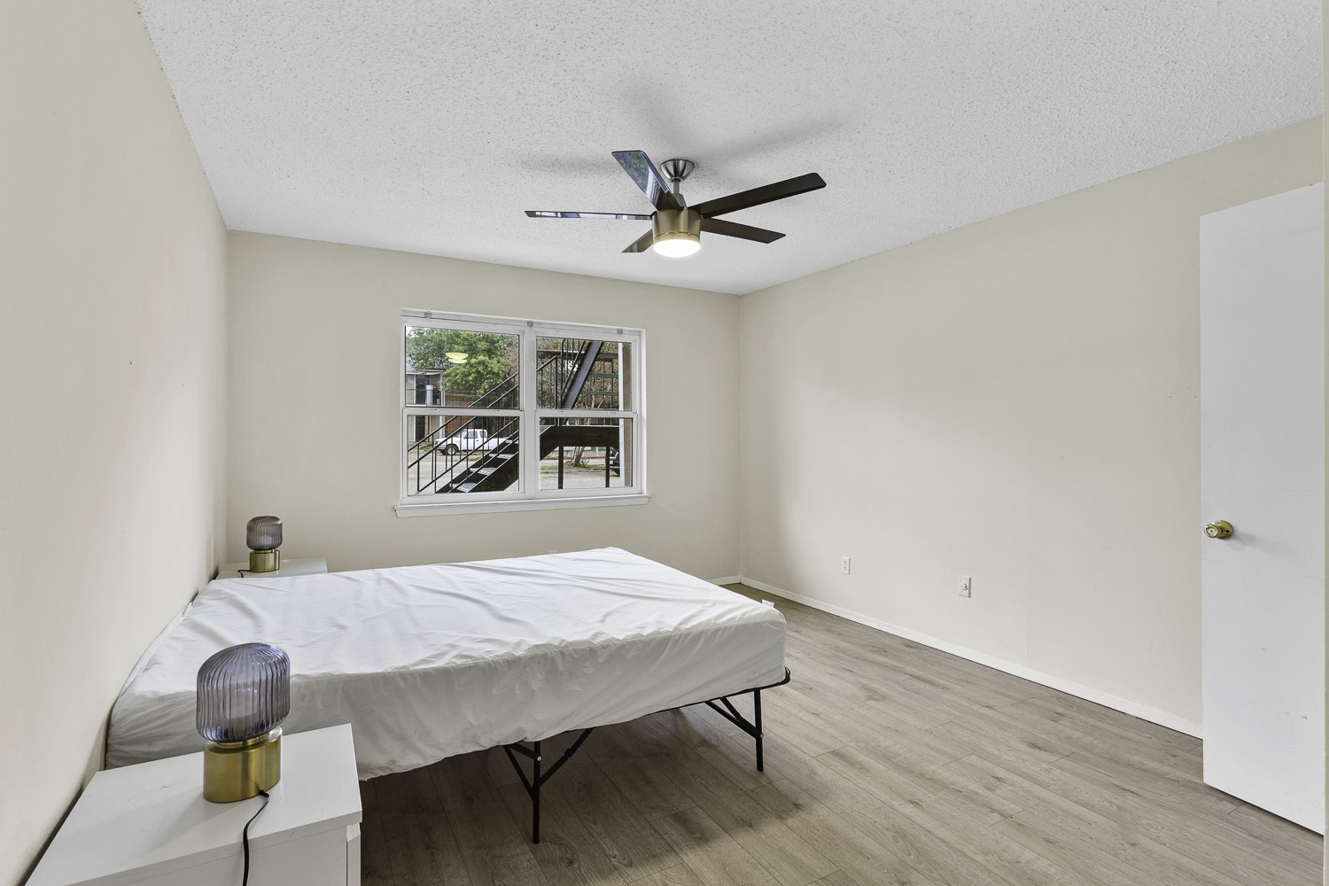 1907 West Loop Austin, TX 78758 - Photo 22 of 31 a view of a dining room with furniture and a window