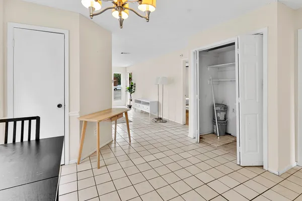 a kitchen with a stove a sink and a refrigerator