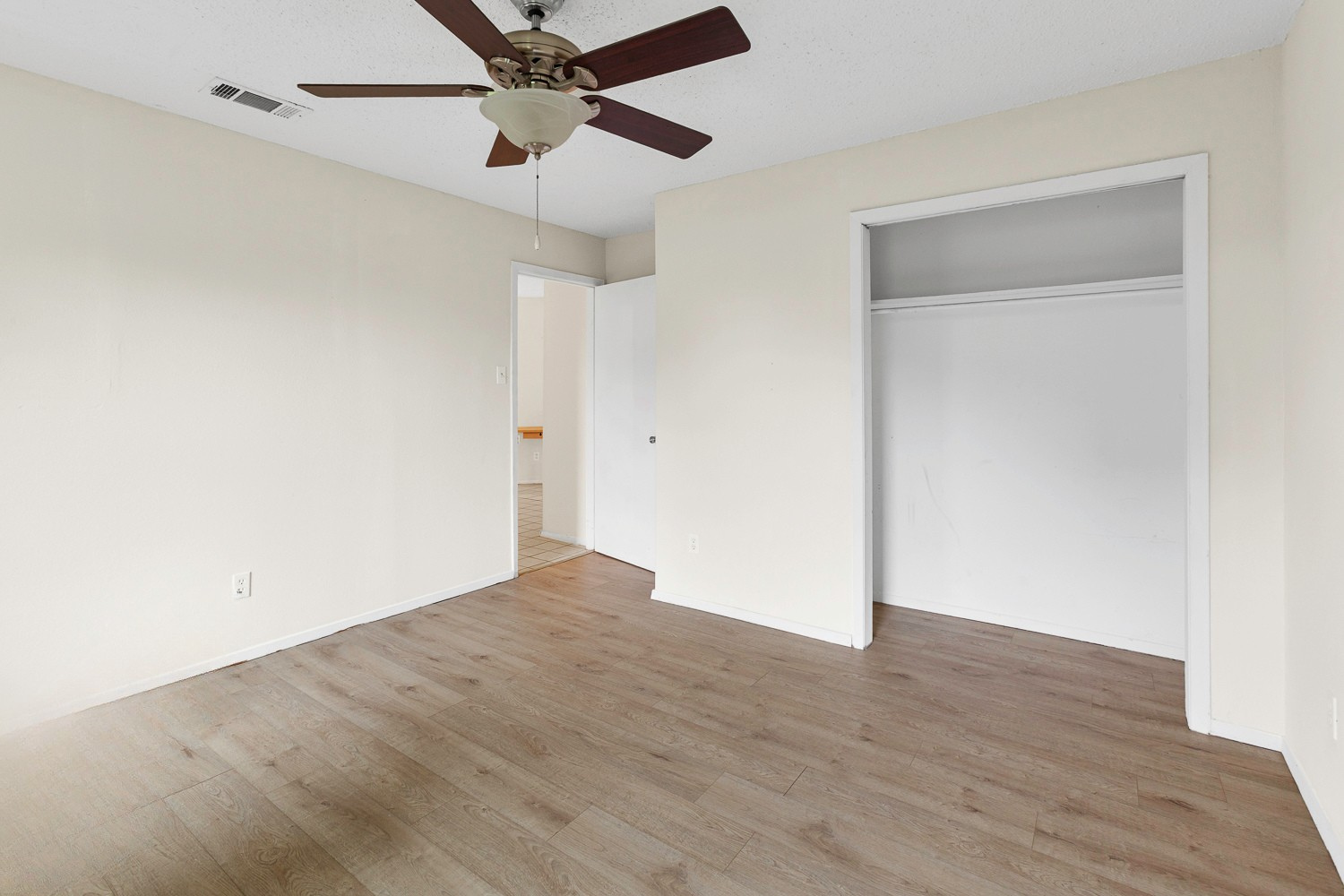1907 West Loop Austin, TX 78758 - Photo 10 of 22 a view of empty room with wooden floor