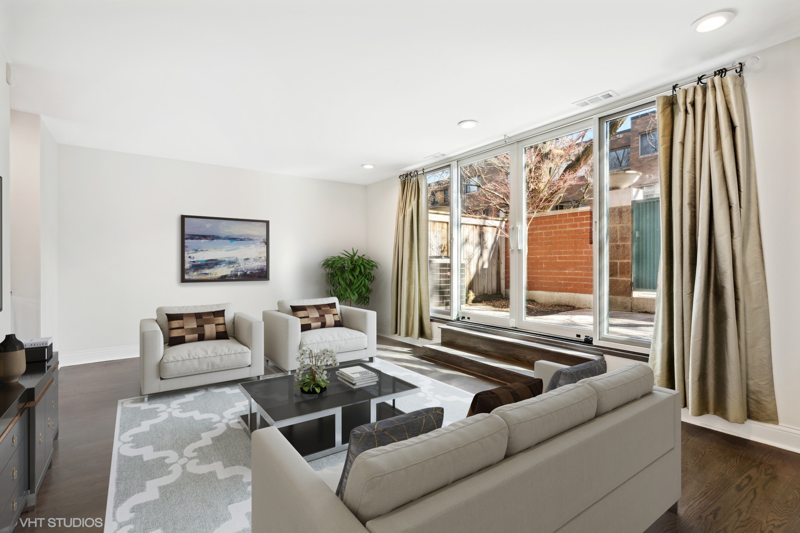 641 West Willow Street, Unit 117 Chicago, IL 60614 - Photo 16 of 44 a living room with furniture and a large window