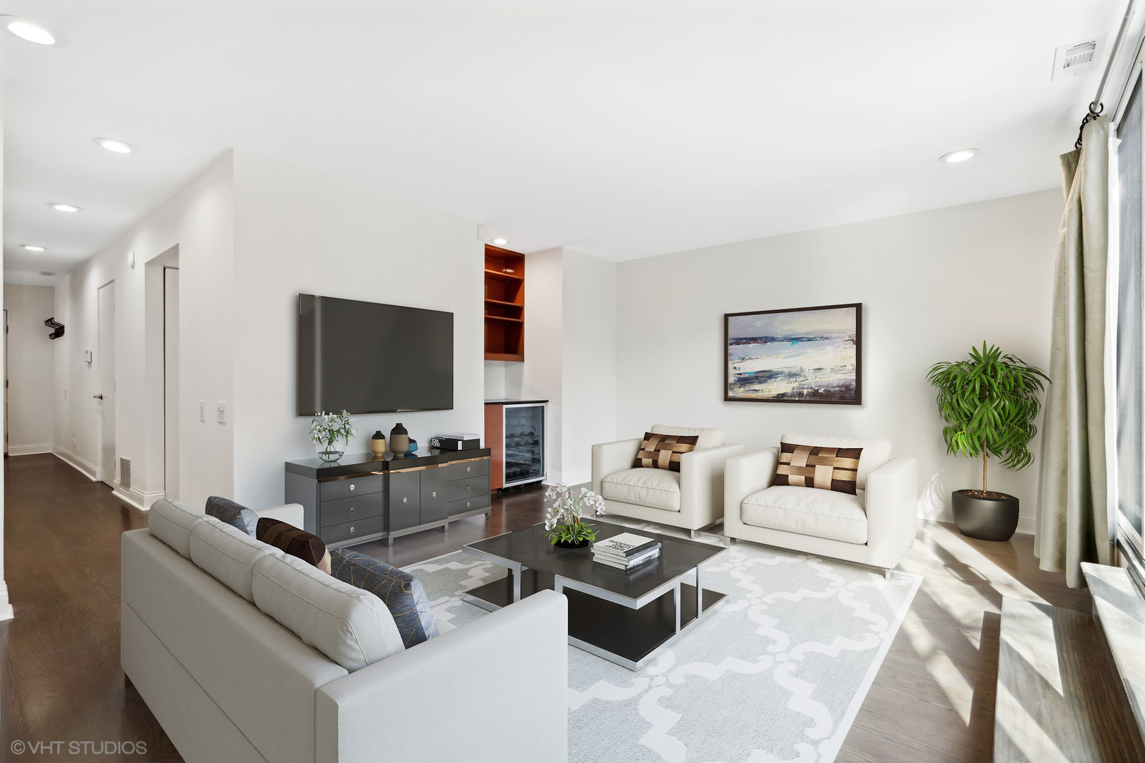 641 West Willow Street, Unit 117 Chicago, IL 60614 - Photo 17 of 44 a living room with furniture and a flat screen tv