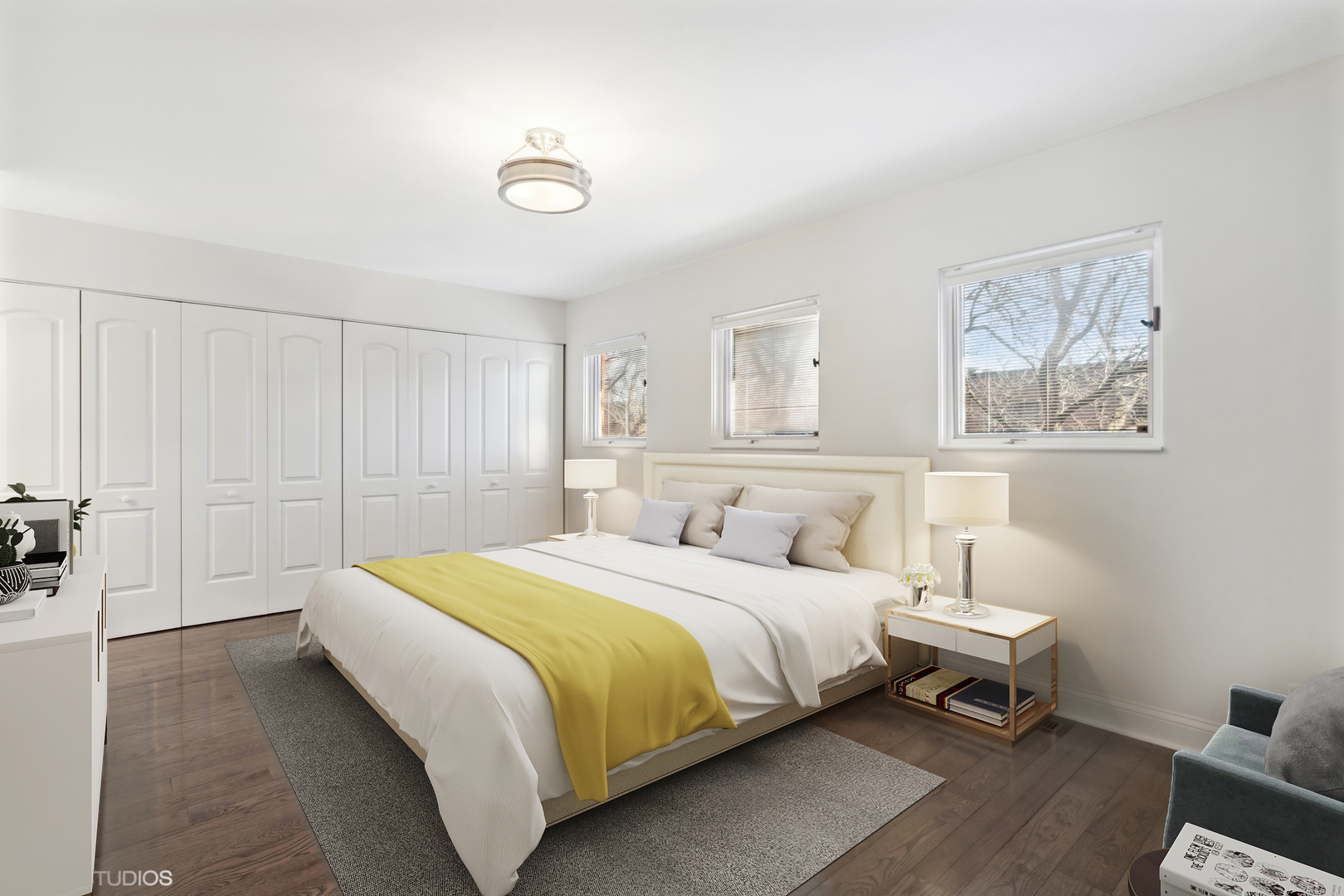 641 West Willow Street, Unit 117 Chicago, IL 60614 - Photo 19 of 44 a bedroom with a bed and a table