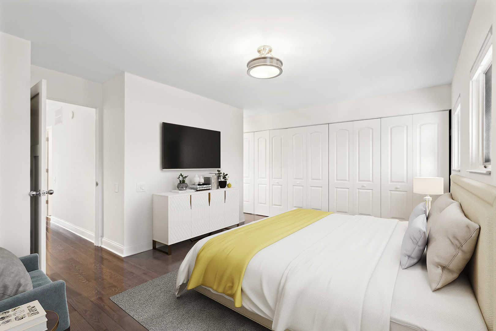 641 West Willow Street, Unit 117 Chicago, IL 60614 - Photo 20 of 44 a bedroom with a bed and a flat screen tv