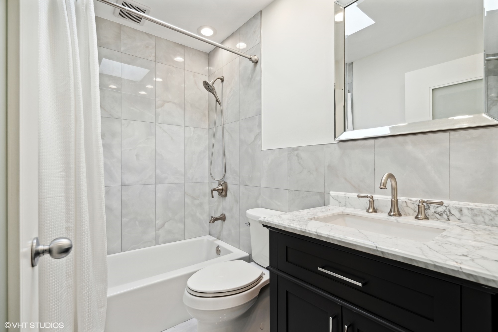 641 West Willow Street, Unit 117 Chicago, IL 60614 - Photo 34 of 44 a bathroom with a granite countertop sink toilet and shower