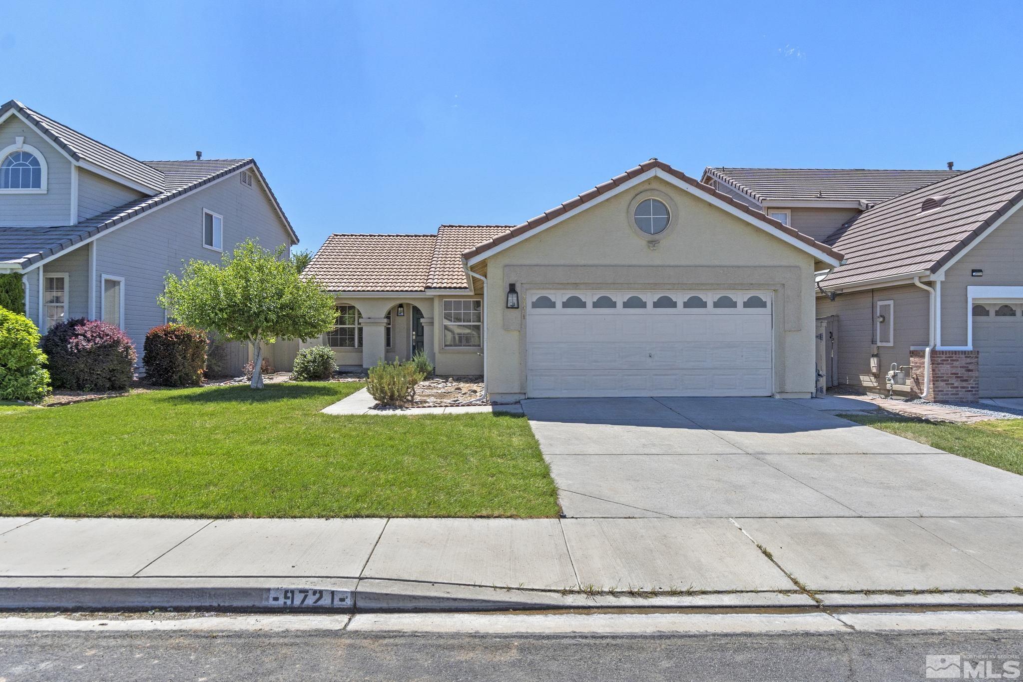 9721 Northmont Lane Reno, NV 89521 - Photo 1 of 40 a view of front of house with a yard