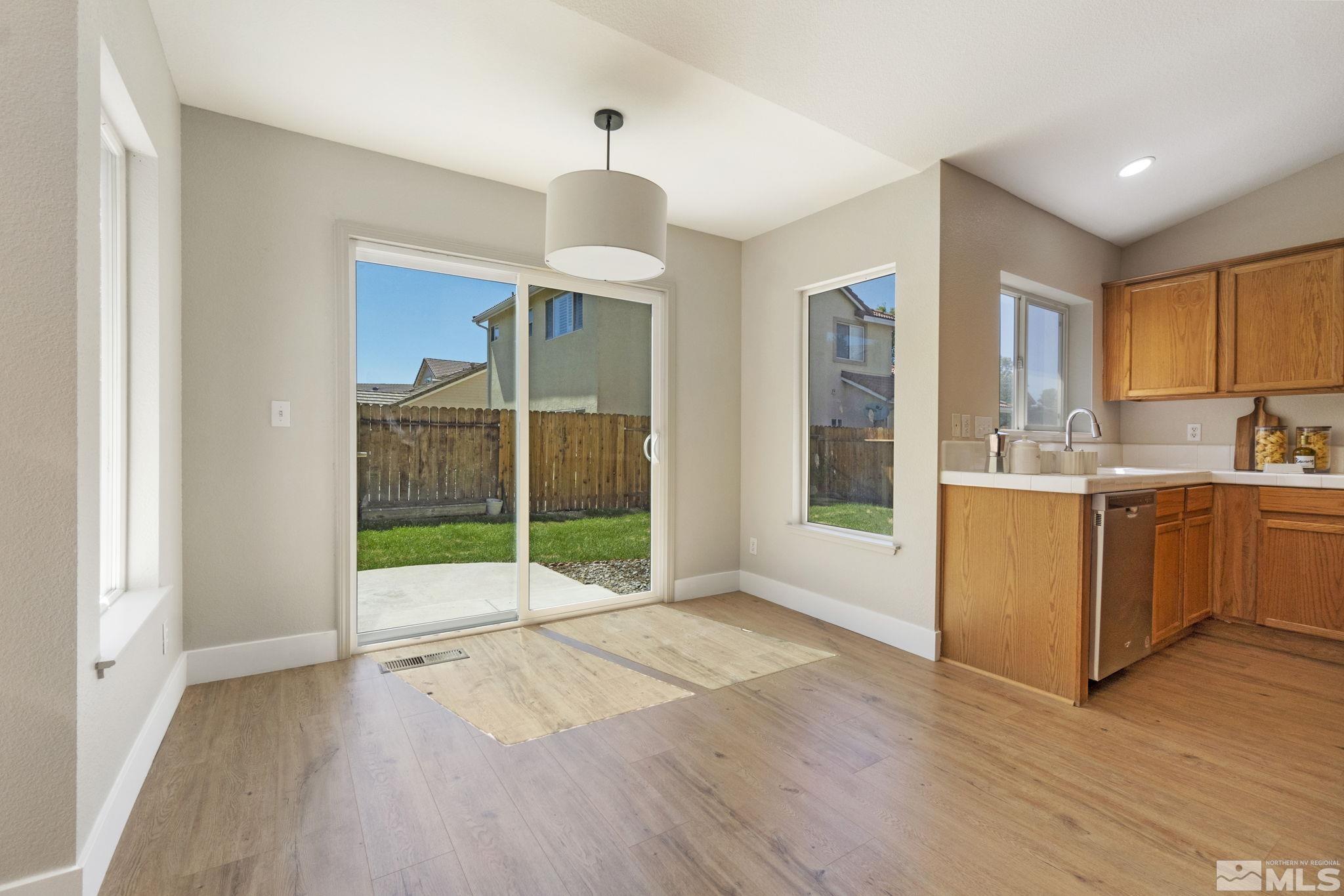 9721 Northmont Lane Reno, NV 89521 - Photo 20 of 40 a view of a kitchen with a sink and a window