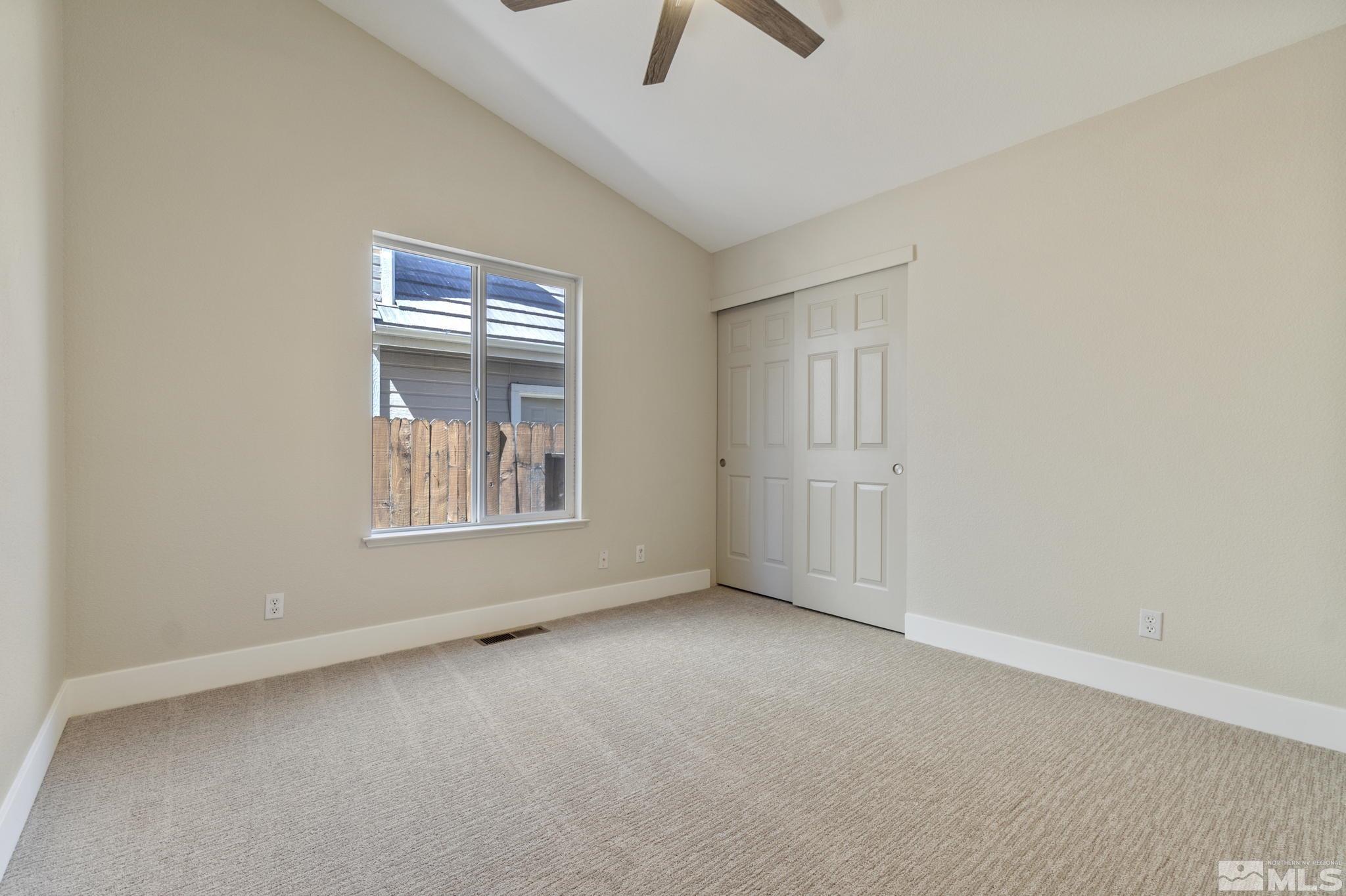 9721 Northmont Lane Reno, NV 89521 - Photo 23 of 40 an empty room with windows and closet
