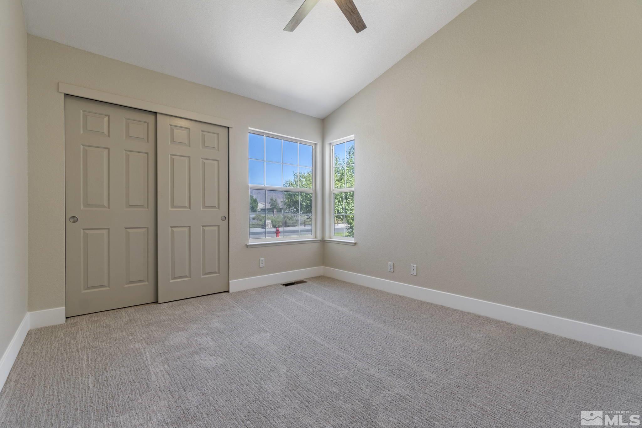 9721 Northmont Lane Reno, NV 89521 - Photo 27 of 40 an empty room with windows