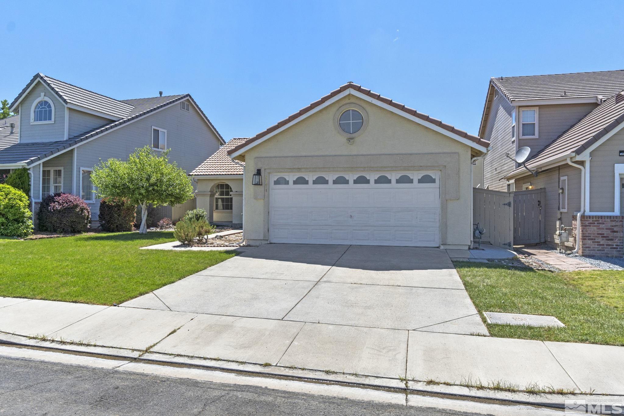 9721 Northmont Lane Reno, NV 89521 - Photo 33 of 40 front view of house with a yard