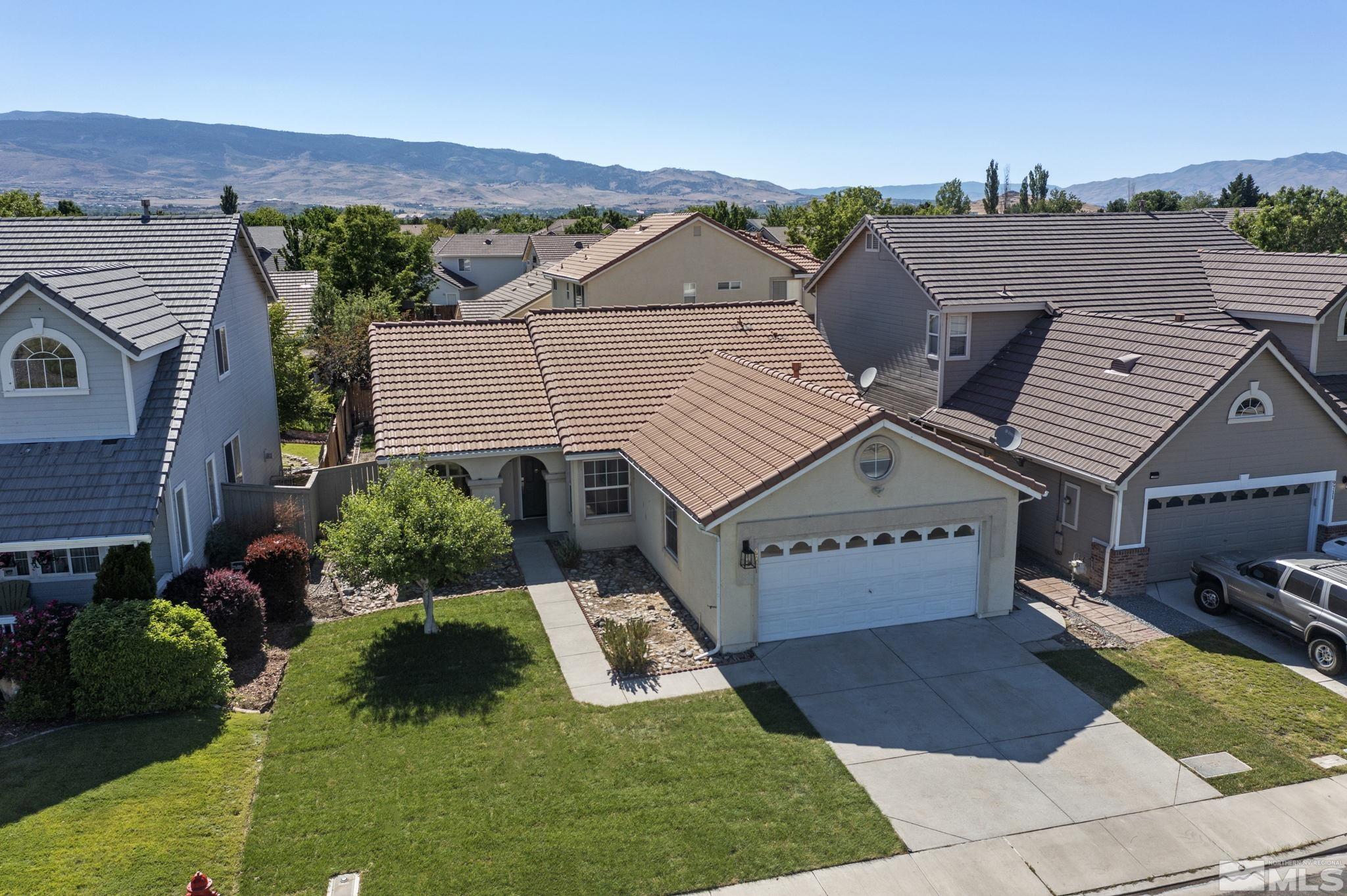 9721 Northmont Lane Reno, NV 89521 - Photo 36 of 40 a view of a house with garden