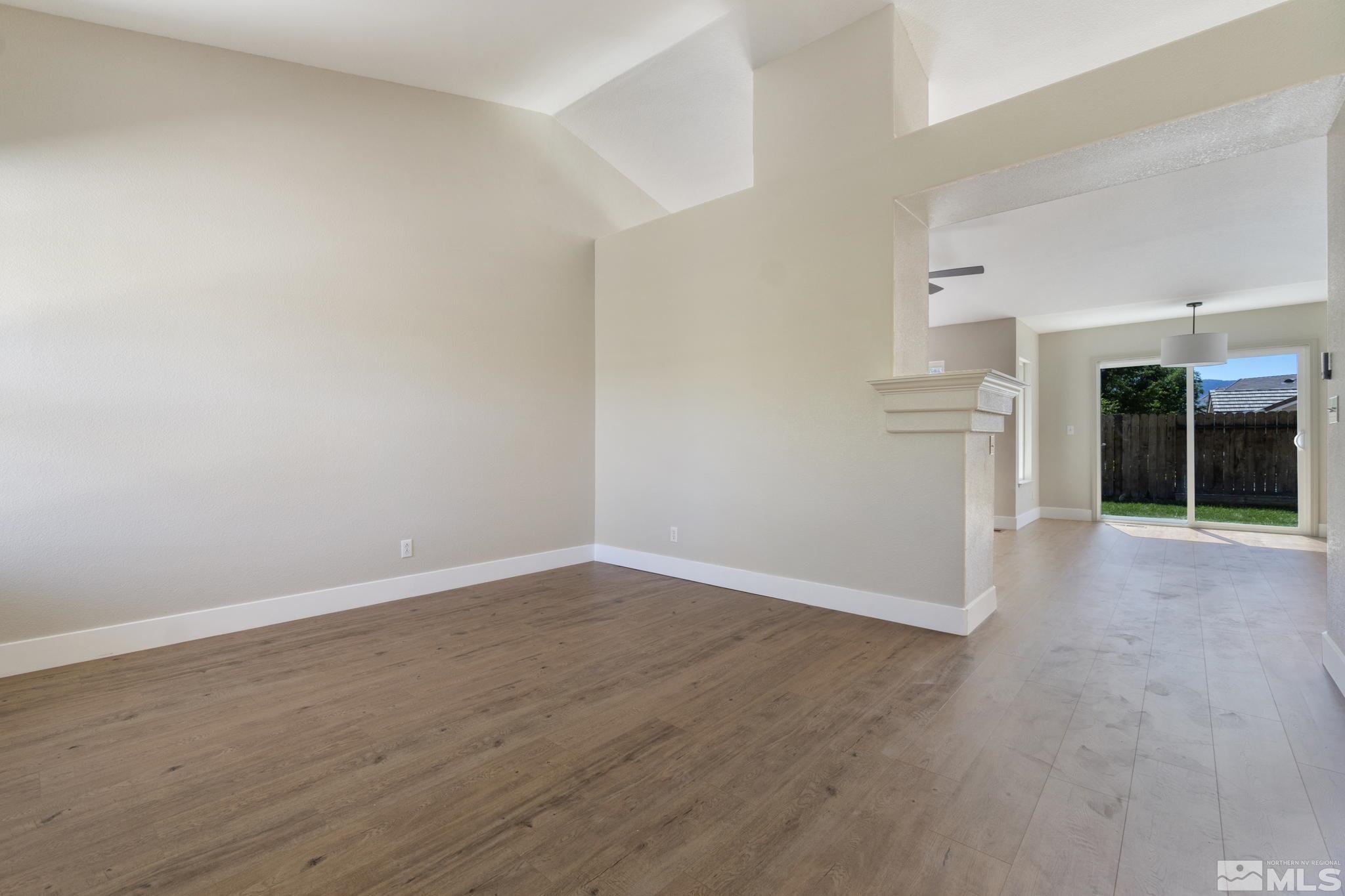 9721 Northmont Lane Reno, NV 89521 - Photo 9 of 40 a view of a room with wooden floor