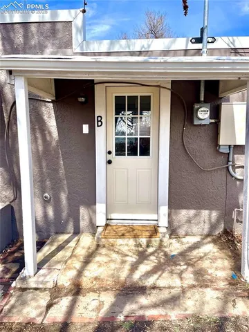 a view of backyard of a house