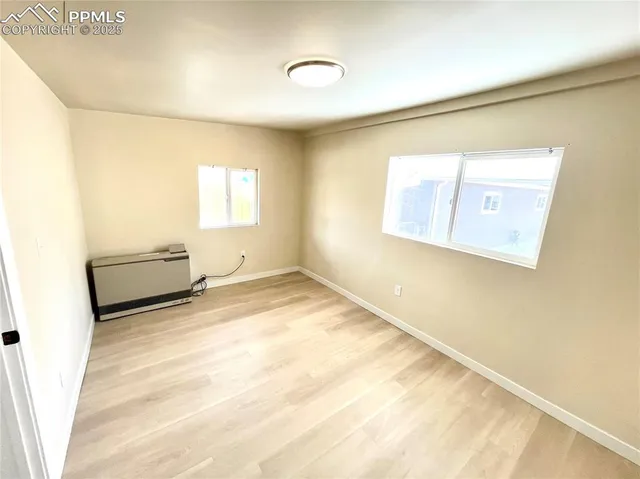 a view of a room with a window