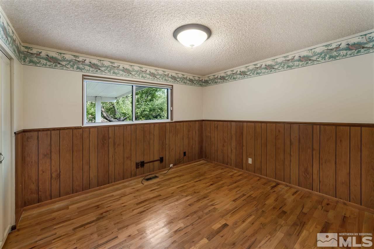 1585 Surf Way Reno, NV 89503 - Photo 9 of 16 wooden floor in an empty room