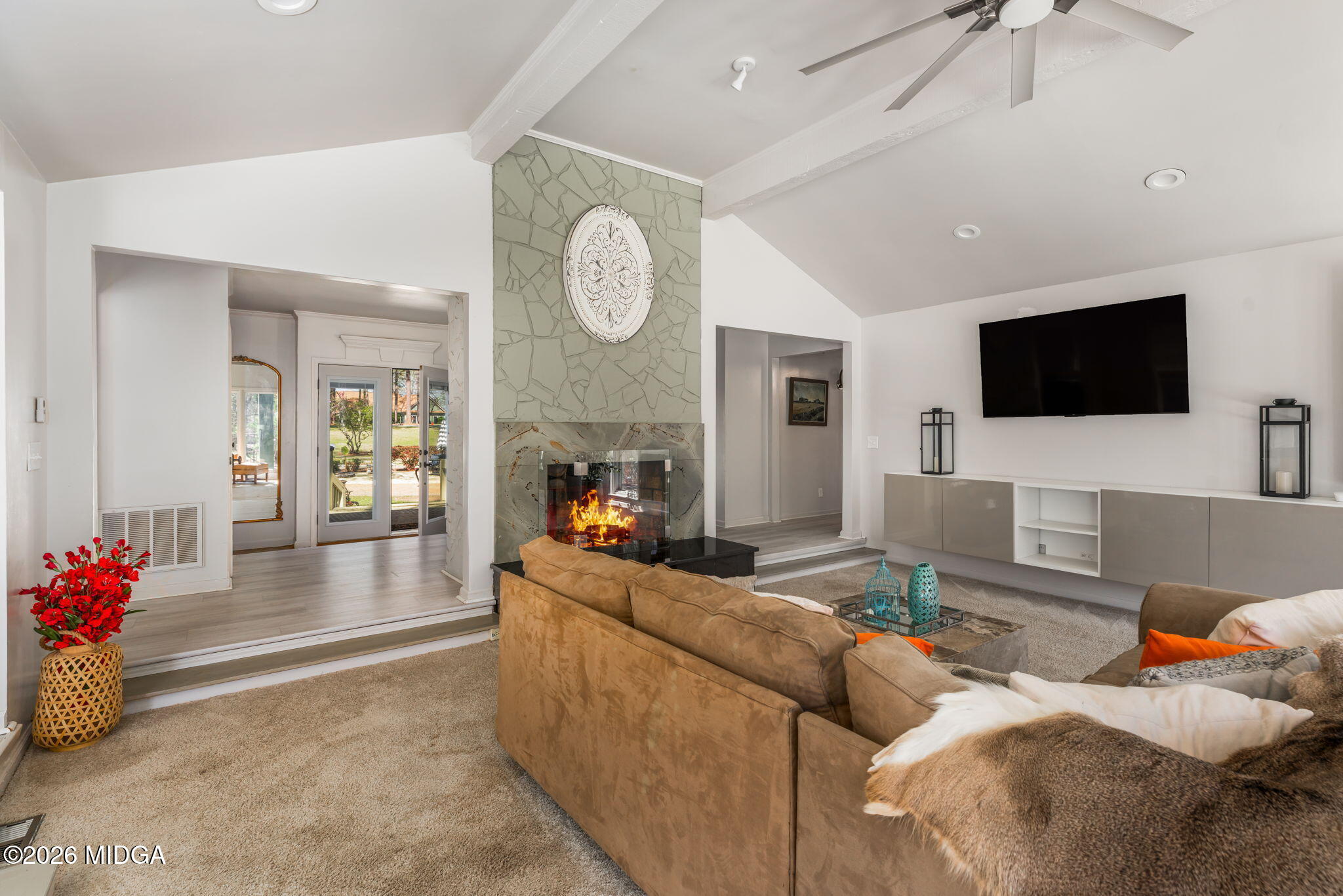 138 Deer Run Drive Macon, GA 31220 - Photo 20 of 114 a living room with furniture and a flat screen tv