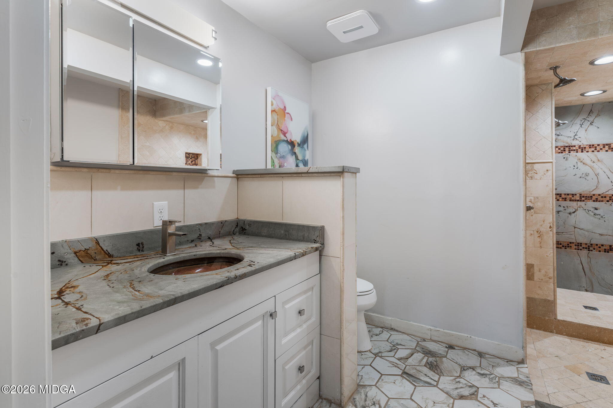 138 Deer Run Drive Macon, GA 31220 - Photo 22 of 114 a bathroom with a granite countertop sink and a mirror