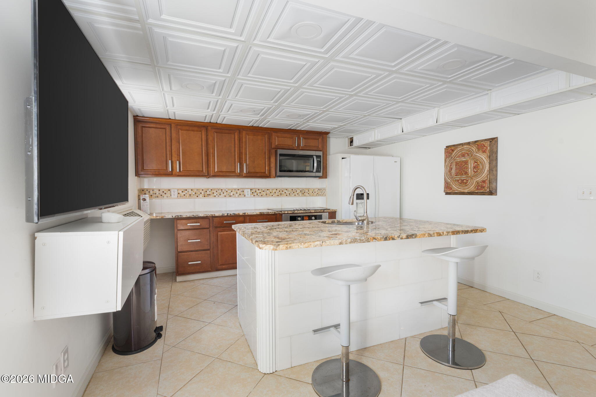138 Deer Run Drive Macon, GA 31220 - Photo 62 of 114 a kitchen with a sink a stove cabinets and chairs