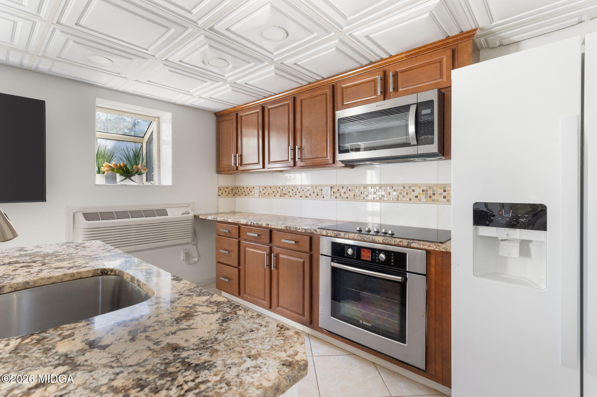 138 Deer Run Drive Macon, GA 31220 - Photo 65 of 114 a kitchen with stainless steel appliances granite countertop a stove microwave and sink