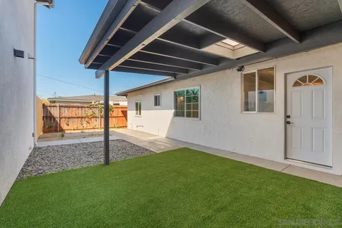 a view of a backyard of a house