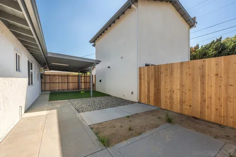 a view of a backyard of a house