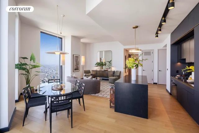 a kitchen with sink refrigerator and window