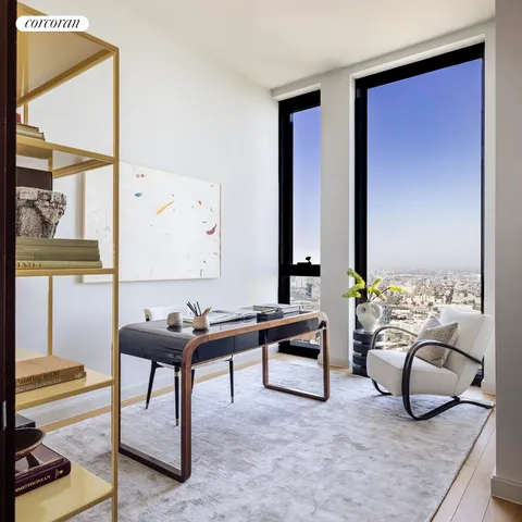 a bedroom with a bed and a lamp